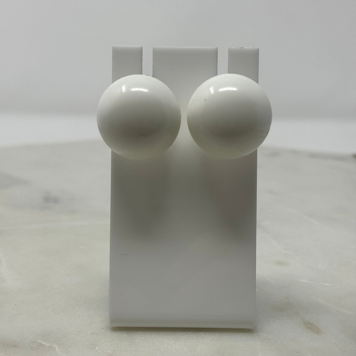Rounded Retro White Clip-On Earrings